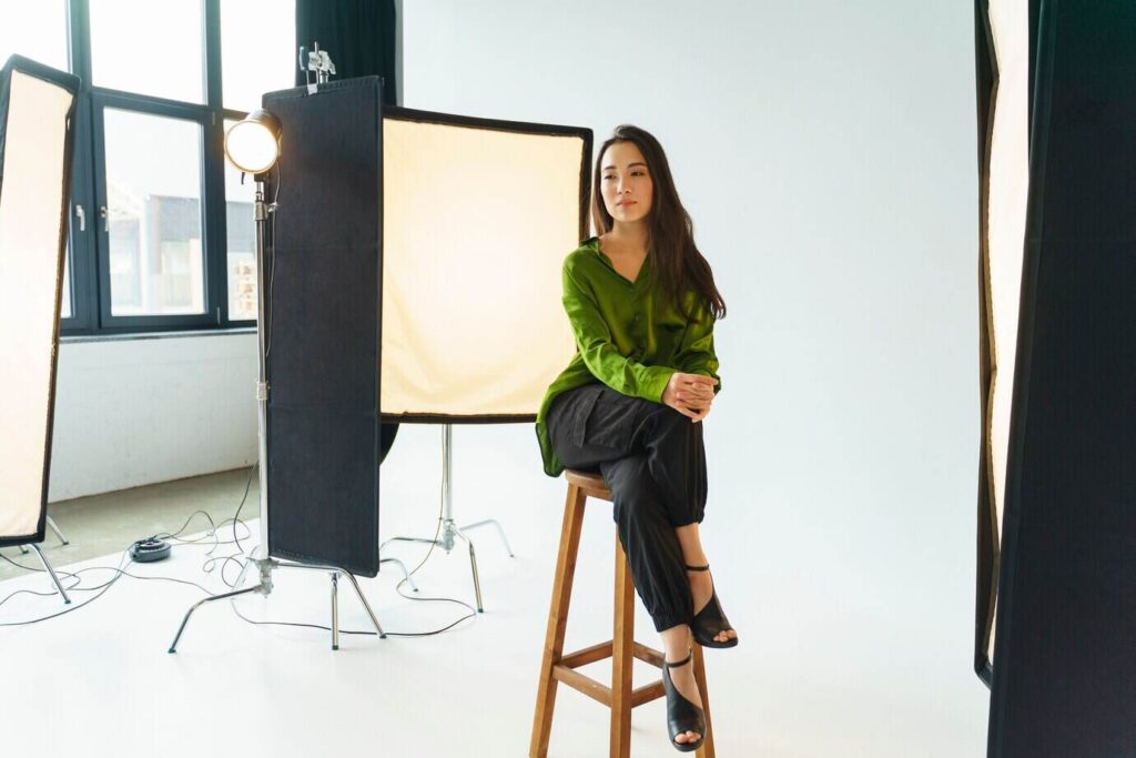 woman posing for a corporate headshot on their office